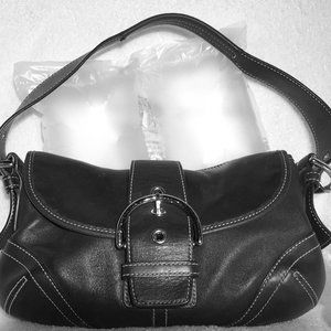 Coach black leather shoulder bag with contrast stitching